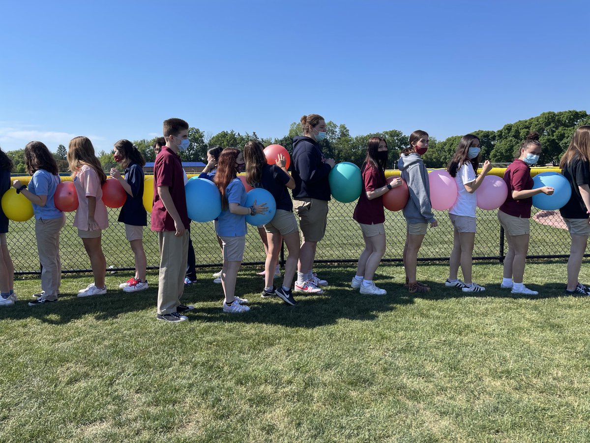 Another year in the can! Shout out to all my great choir students for their resilience and great work this year under crazy circumstances! Pictured below is a scene from our Choir Olympics... “Caterpillar Races.”
2 teams race around the baseball fence… first one back wins!