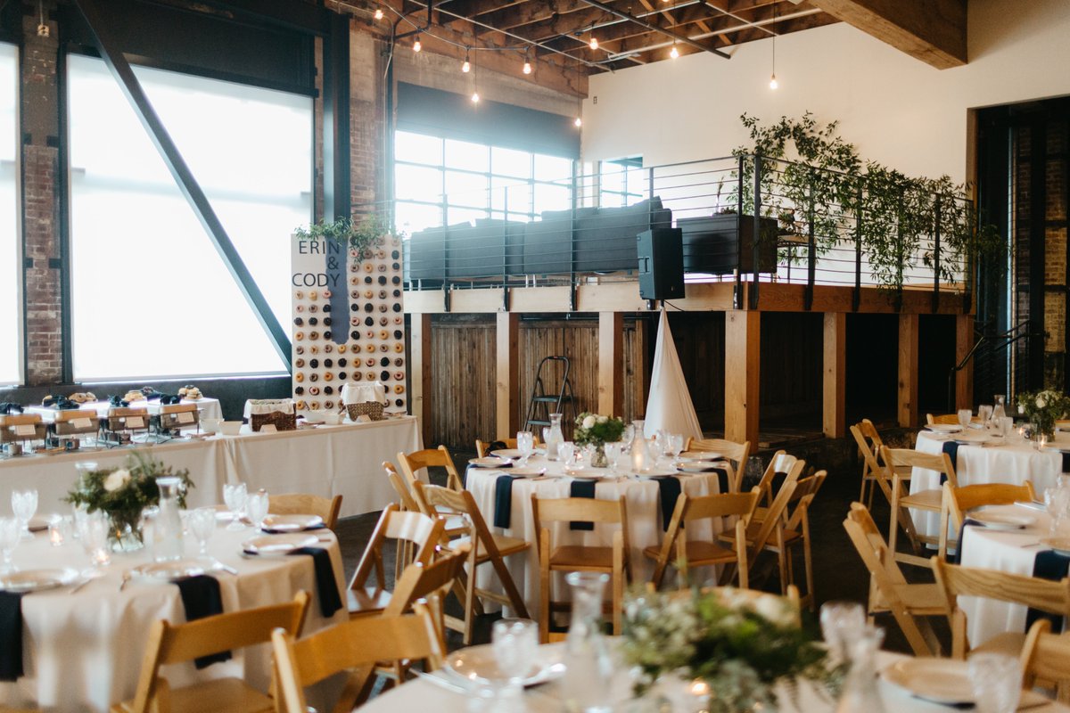 Erin and Cody's wedding had it all! Beautiful floral, a donut wall, and more. Head over to our website to see more of this stunning wedding. 

Photographer - Kate Ames Photography