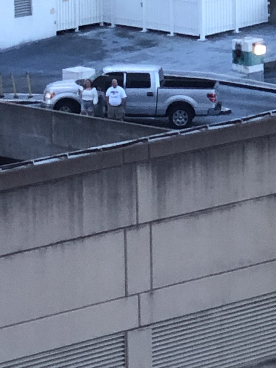 ReedAPPsych's tweet photo. I am currently in quarantine for stem cell transplant so today Doug and @shelbyyyreed drove to the parking garage outside my window to wave to me, heart is super full.  Been rough but going to put this cancer in remission https://t.co/pJqtAD6MXG
