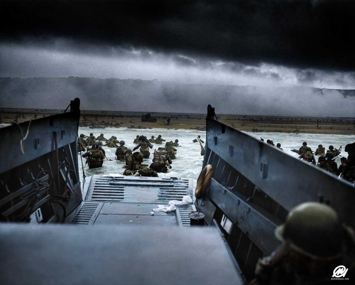 This Day in #WWII #History: Men of the 16th Infantry Regiment, U.S. 1st Infantry Division wade ashore on Omaha Beach on the morning of June 6, 1944 (colorization by <a href="/marinamaral2/">Marina Amaral</a>).

#DDay #DDay77
