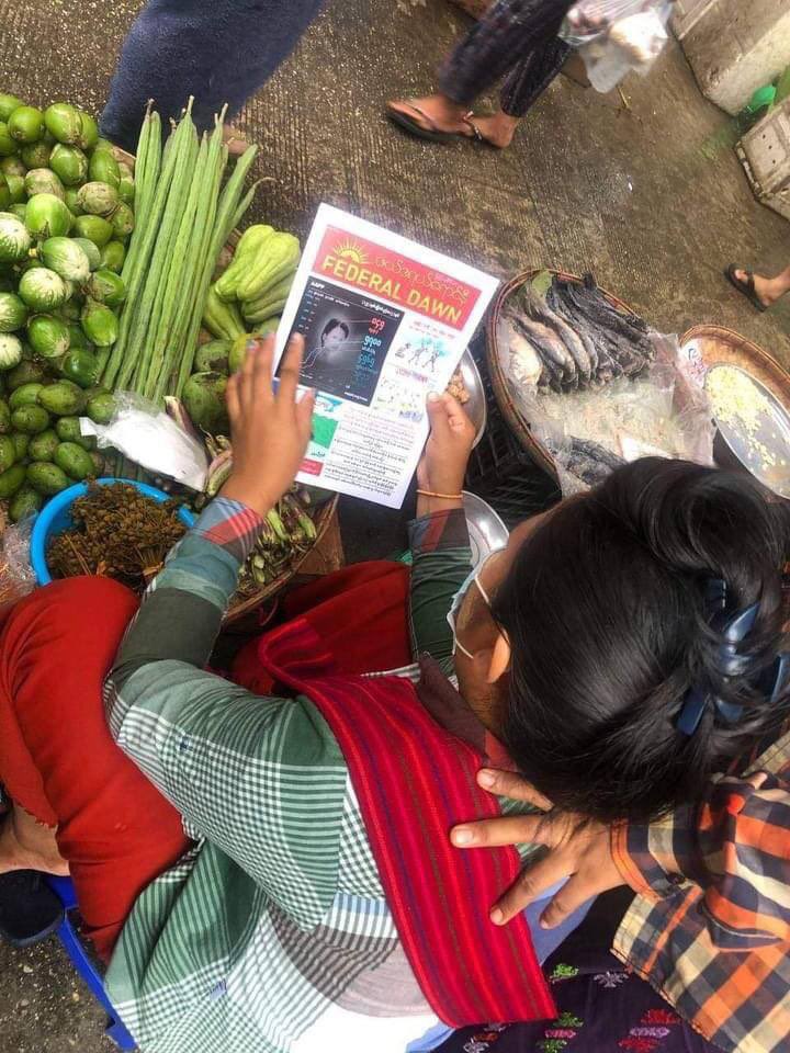 Potatone_21's tweet photo. A group of people distributed 500 revolutionary leaflets (Federal Dawn) in Yangon's busiest areas, Sule and Hledan, to let people know that the revolution is still going strong. #RejectCoupRejectASEAN #June6Coup #WhatsHappeningInMyanmar https://t.co/4Y5CAyRS3M