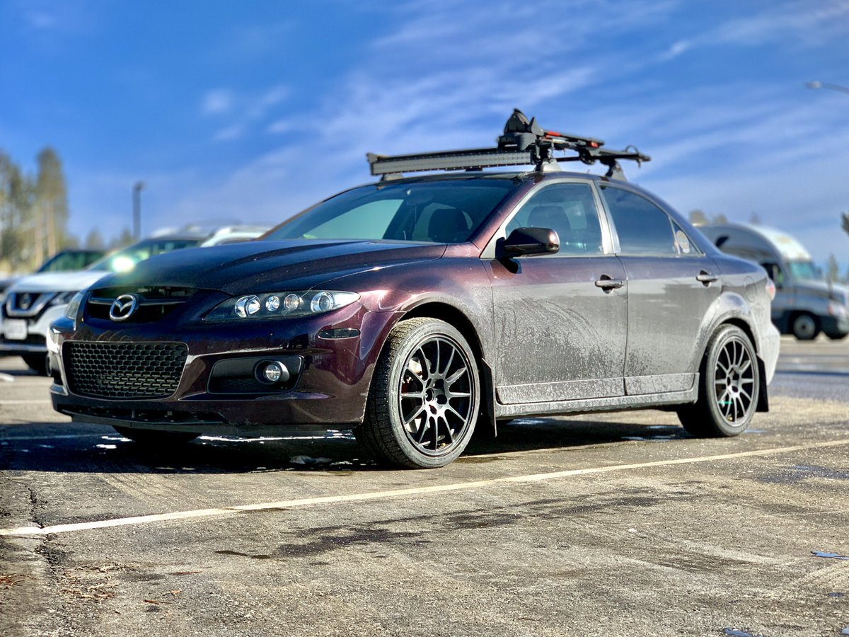The driver, the daily, and the race car.