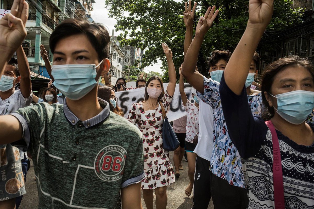 Shoon_Naing's tweet photo. Yangon on Monday as protesters flash three fingers salute during a flash mob protest. 
Photo by Zarni Phyo. 
#WhatsHappeningInMyanmar #June7Coup https://t.co/hnAdM7KXj6