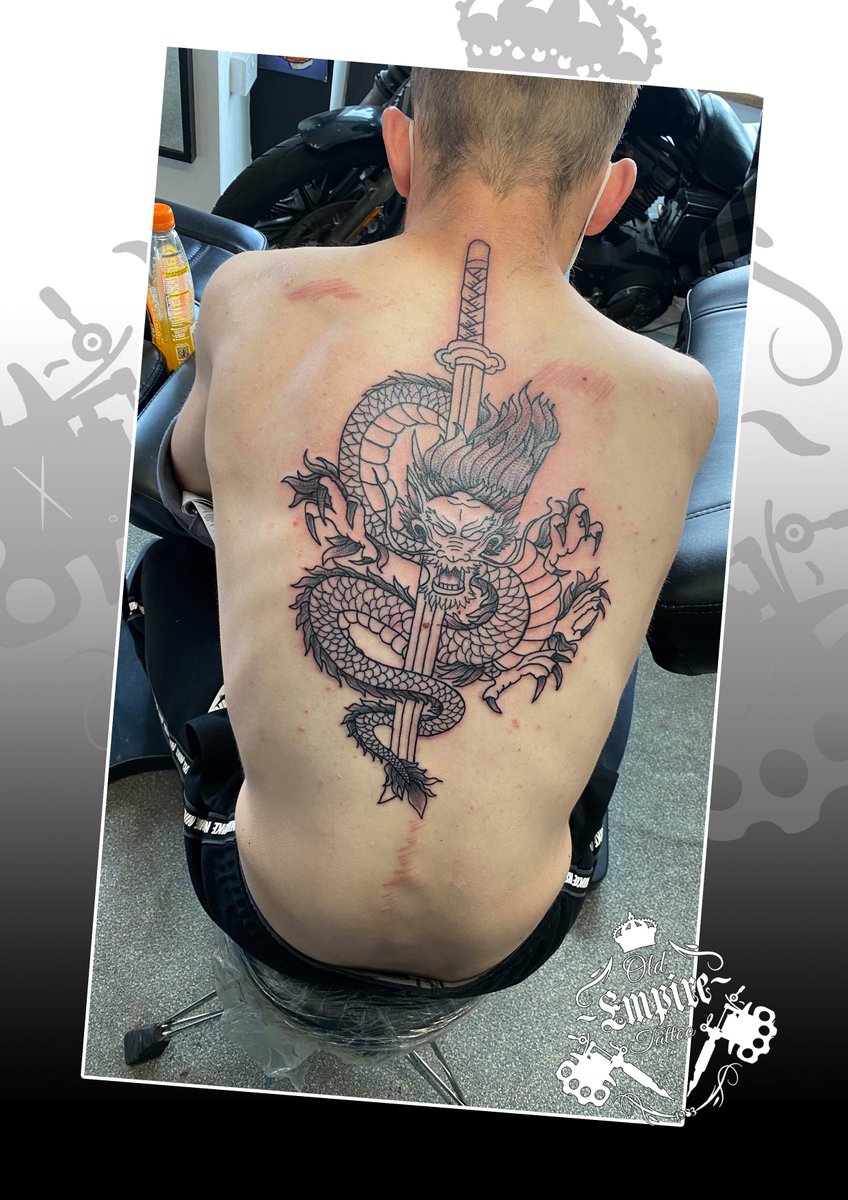 Share more than 65 dragon and sword tattoo best in.eteachers