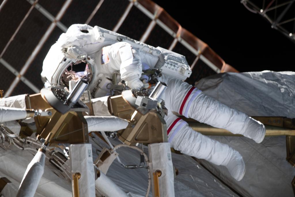 Astronaut doing a spacewalk at the space station.