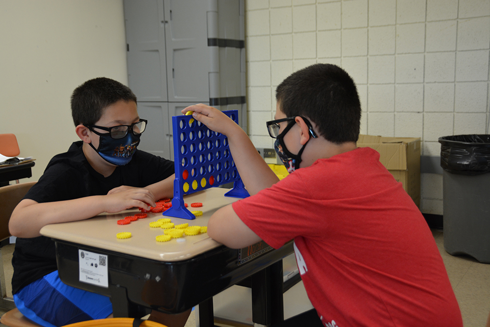Erie1BOCES's tweet photo. Fourth-graders Noah and Justin Girdlestone from Lackawanna City Schools play Connect 4 to develop their cooperative play skills during class at West Seneca West Elementary. #BOCES #ExceptionalEd https://t.co/111dOiRVnB