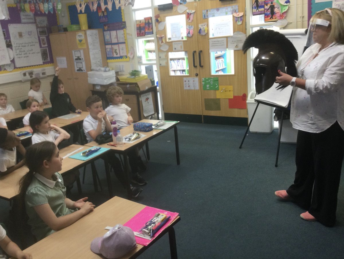 gates_owls's tweet photo. This afternoon, Owls Class enjoyed a visit from Ann @BoltonLMS . She explained why she loves her job by sharing artefacts #Trexclaw #Spartanhelmet and sharing a very funny story with us by @SteveRT1 #poointhezoo #TheGatesAspirationsWeek https://t.co/prRVbum4sM