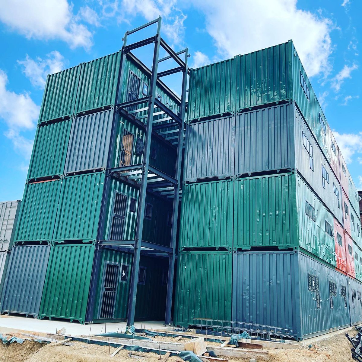 Structures_ZA's tweet photo. Our contribution towards the Madala Hostel dedinsification project in Alexandra, 2 bedroom family & bachelor units. #containerstructures #thefutureofbuilding #alternativebuildingsolution #containerarchitecture #containerhomes https://t.co/GMixrx89FD