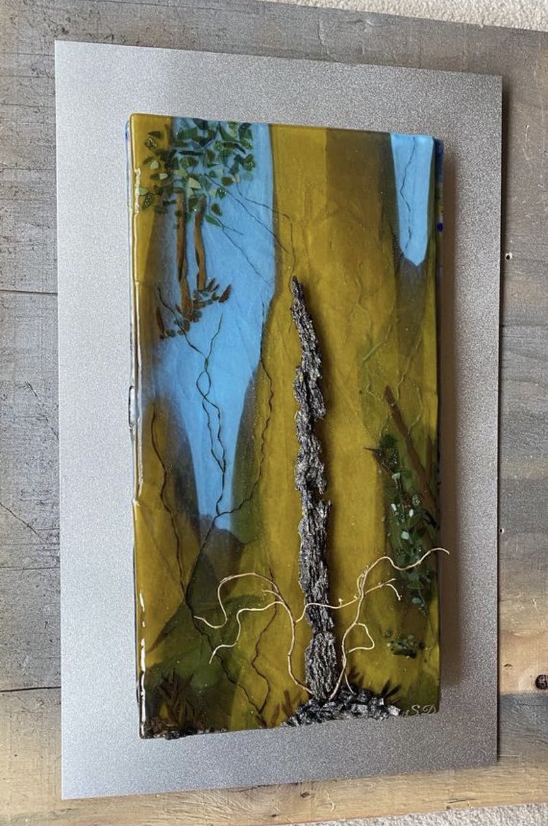 Contemporary fused-glass panel with rock chips, tree bark and twigs preserved with resin to protect them against the environment.  Mounted on a Metal Frame 
lnkd.in/eX69UmK
#interiorart  #glassart #contemporaryartist