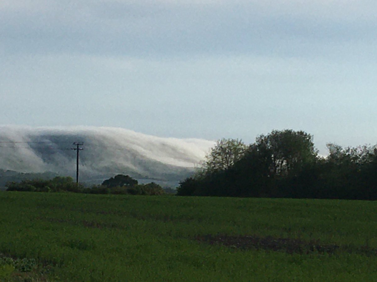 Clouds rolling down the South Downs  stunning and odd all at the same time