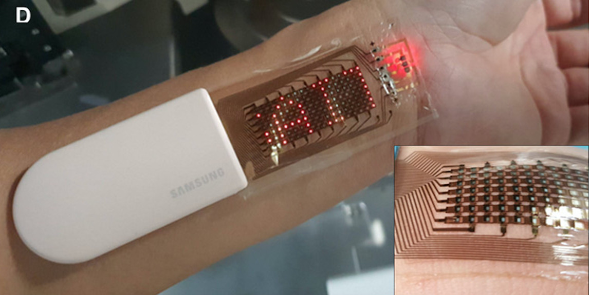 verge's tweet photo. Samsung shows off stretchable OLED screen in prototype heart rate monitor https://t.co/hQxm2eKrXO https://t.co/yXWh5uDa6D