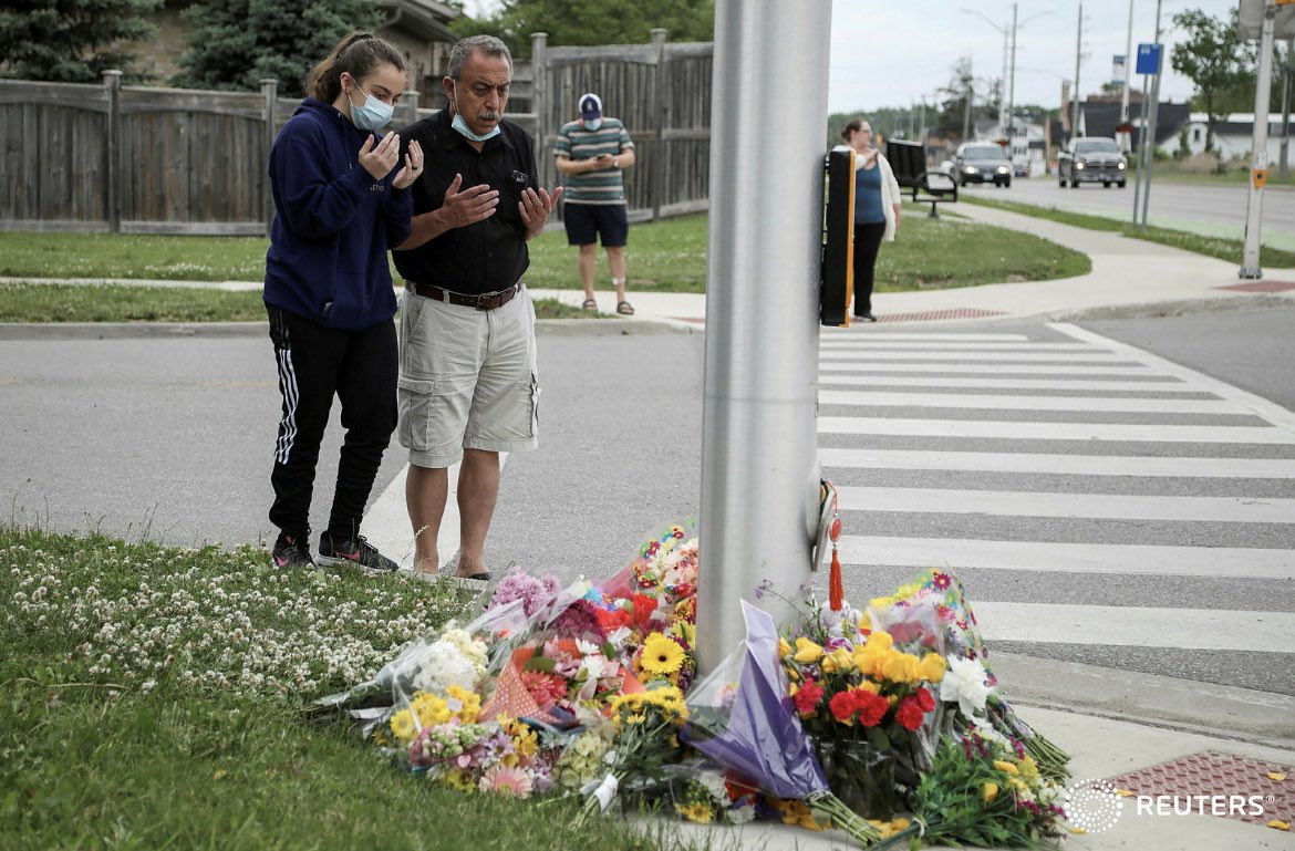 idreesali114's tweet photo. Abdullah Alzureiqi and his daughter Hala say a prayer at the fatal crime scene where a man driving a pickup truck jumped the curb and ran over a Muslim family in what police say was a deliberately targeted anti-Islamic hate crime, in London, Ontario, Canada. REUTERS/Carlos Osorio https://t.co/hnbcbLTBU9