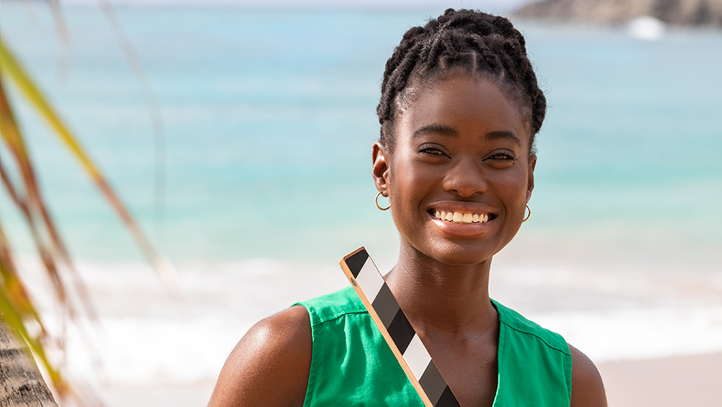 Shantol Jackson smiling by the sea
