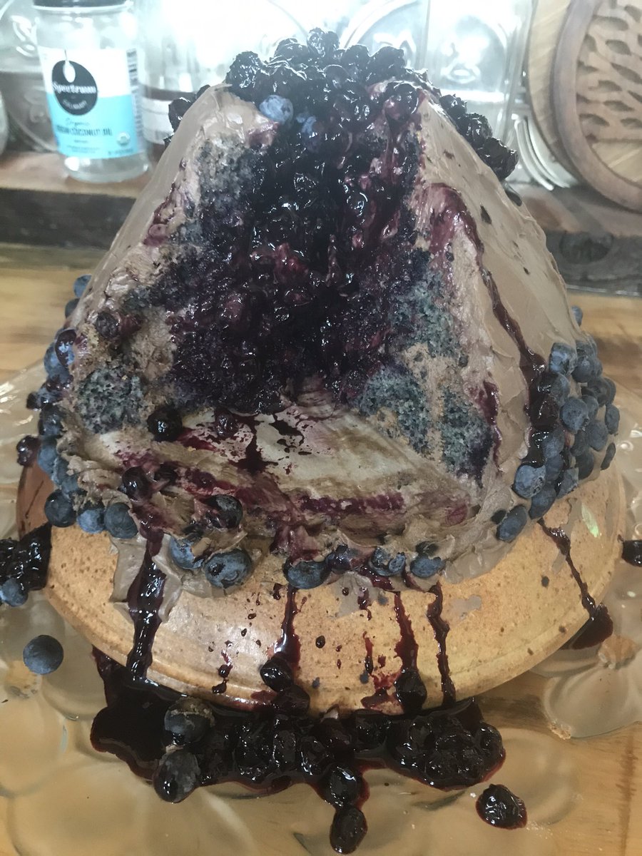 So 5 turned 6 yesterday. He wanted a blueberry cake, but it collapsed in the oven. So I took the pieces &amp; built him a blueberry volcano eruption. He was very happy. I love that I can sometimes turn my visions into tangibles, as well as stories. #cakedecorating #MomsWritersClub