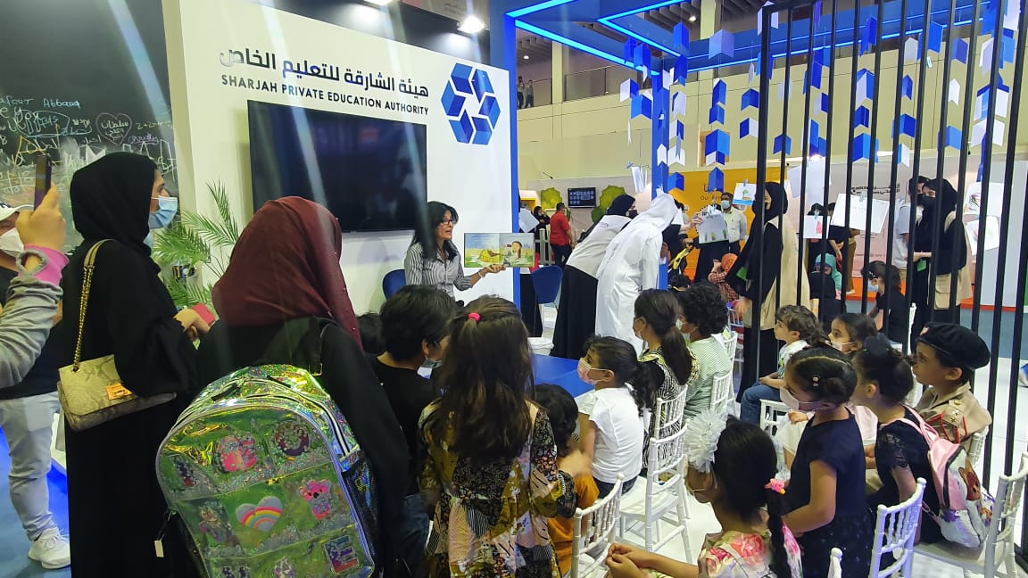 AIS_SchLibrary's tweet photo. Our very vibrant school librarian, Ms. Nawal, reading an Arabic book to a group of young readers at the Sharjah Children's Reading Festival. هيئة الشارقة للتعليم الخاص @SharjahBookAuth  
#AISSchLibrary #AISReading #AISCommunity https://t.co/JzRtSDZz9g