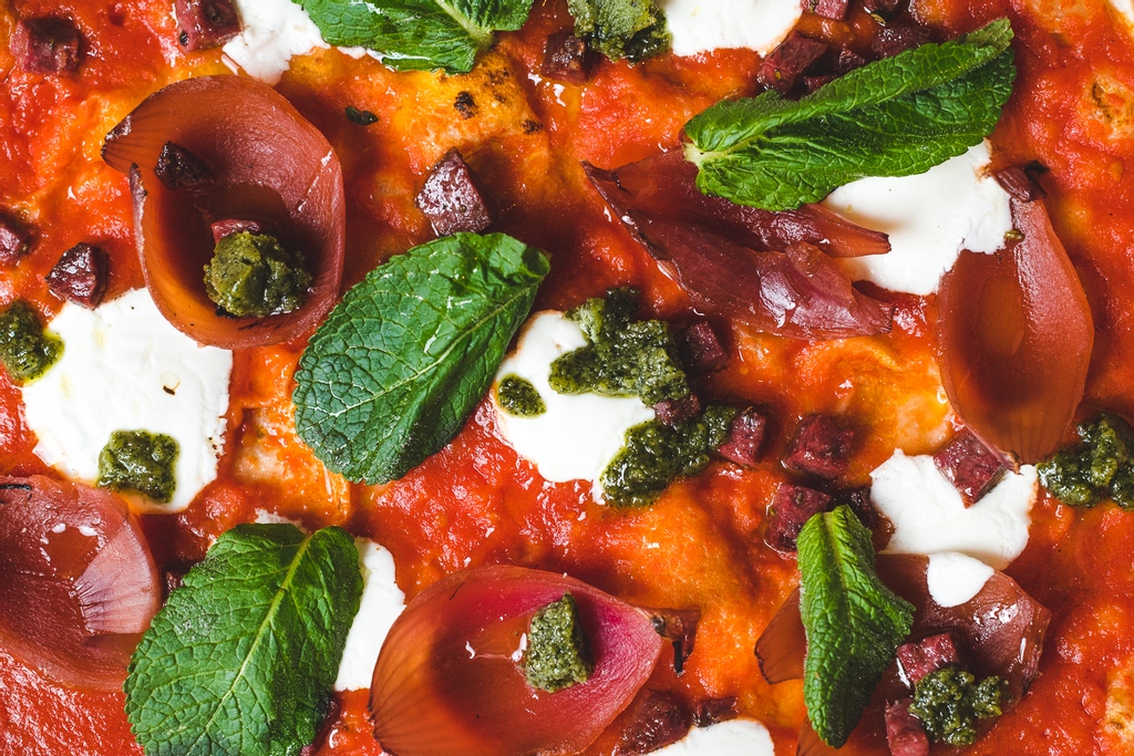 Goat Salami by Cobble Lane Cured, Goats Curd, BBQ burnt Onions with Soy &amp; Chilli, fresh Mint and Pesto... You've Goat'a Be Kidding Me?! 🤪 

This isn't ordinary pizza. 🔥