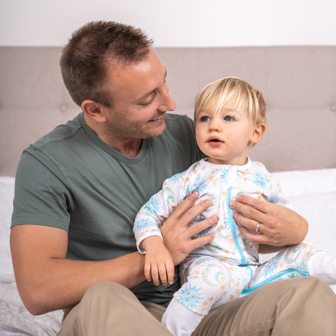 Rabbitskip1's tweet photo. Safe in dads arms, but always reaching for the stars! This dreamy jumper will make snuggle sessions that much sweeter. 🪐 #RabbitSkipRoad https://t.co/YMyeZNOCeP