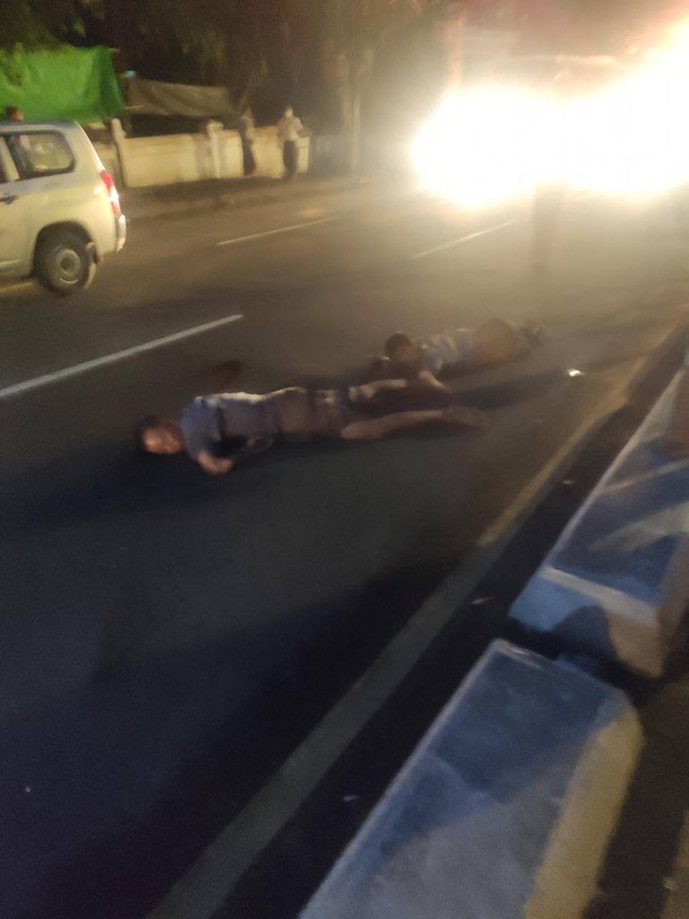 A toyota Mark X black car hit two civilians and run away in front of NgarHtetGyi pagoda on ShweGonDaing road,Yangon. One is bleeding from the head and passed out while other one is moving slightly. #RejectCoupRejectASEAN #June8Coup #WhatsHappeningInMyanmar