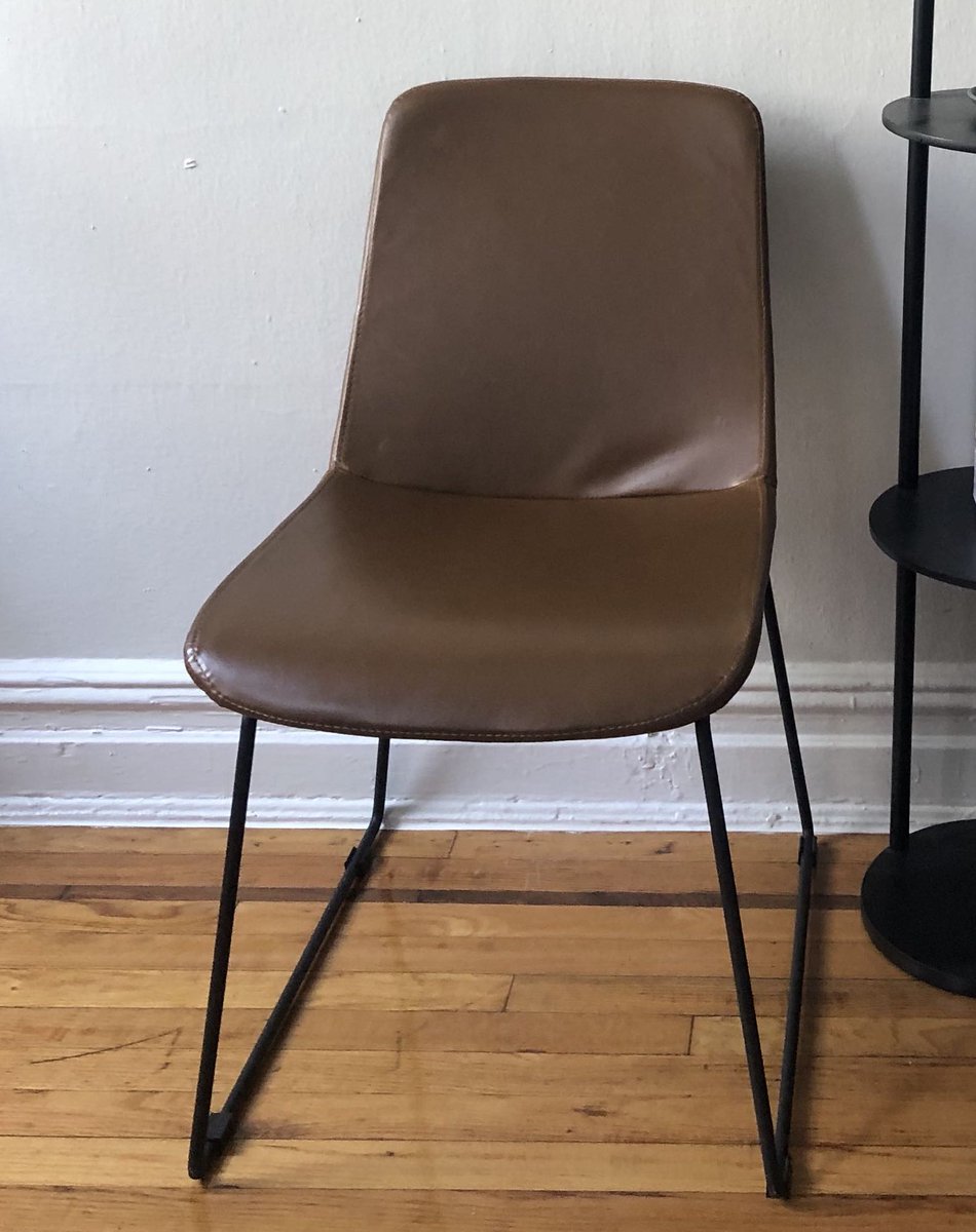 thalith's tweet photo. @AptDeco ordered 4 chairs. this is what i ordered and what i actually received. Your returns dept refuses to take them back and said this "These are the same model, type, and finish as is listed. The finish can vary due to natural variations in the dyeing process of leather." https://t.co/jcGwwBZHUr