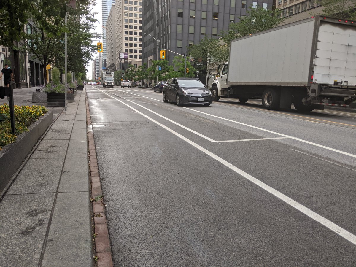 CycleToronto's tweet photo. The temporary #ActiveTO bike lanes on Bloor (Avenue-Church) have been realigned with parking protection. Concrete curbs and planters are on the scene. Crews are out today: keep an eye out for closure of lanes.
Want it permanent? 📝Sign #KeepActiveTO: https://t.co/aP9bOwoVkk https://t.co/AJ6tybRK8K