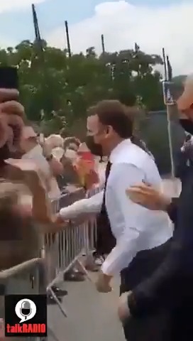 WATCH French President Emmanuel Macron was slapped across the face by a man yelling "Down with Macronia!"