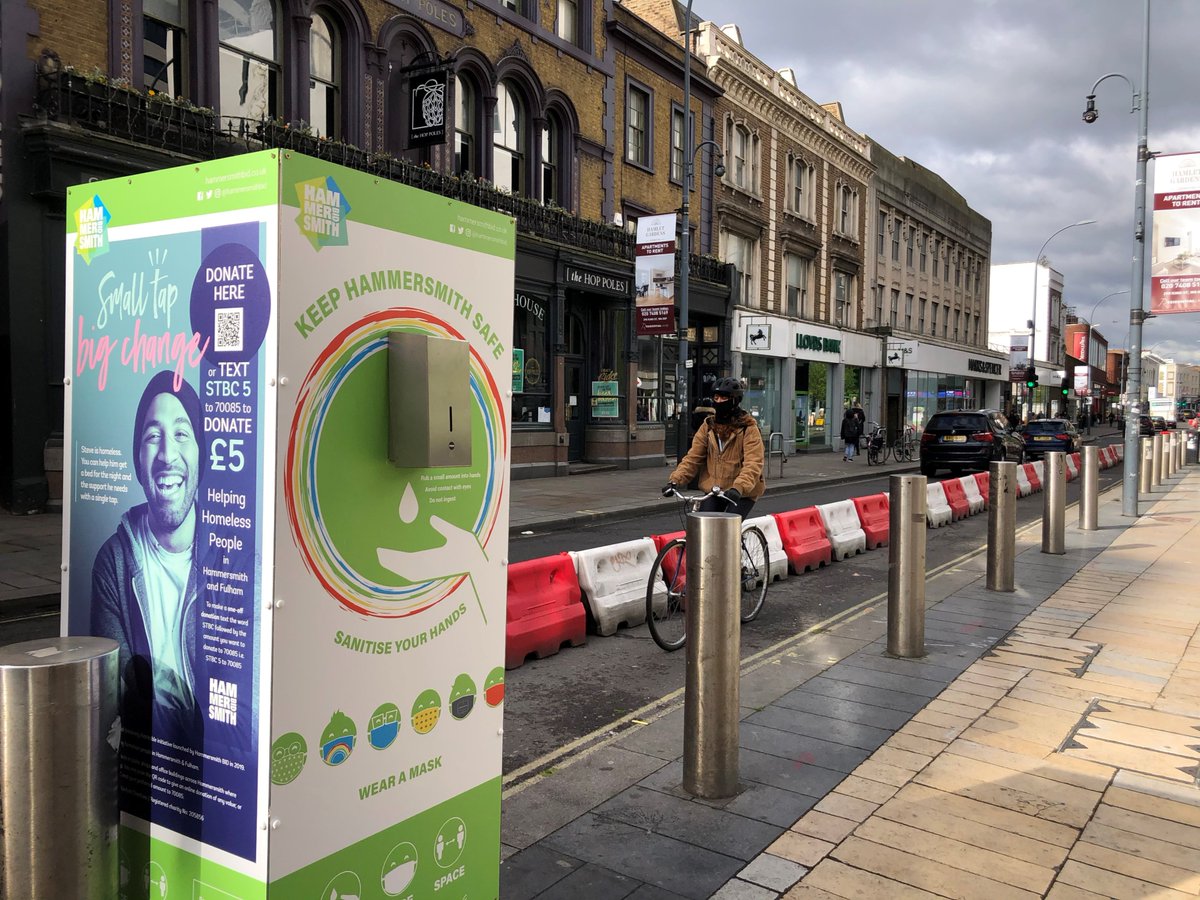 HammersmithBID's tweet photo. Our Hand Sanitiser stations throughout the town centre are there for your comfort and safety - and also tell you a little bit about the BID's projects. Use the QR codes to apply for your Privilege Card - or donate to  #smalltap_bigchange
#shoplocalshopsafe
#lovehammersmith https://t.co/wuSTa62kQ1
