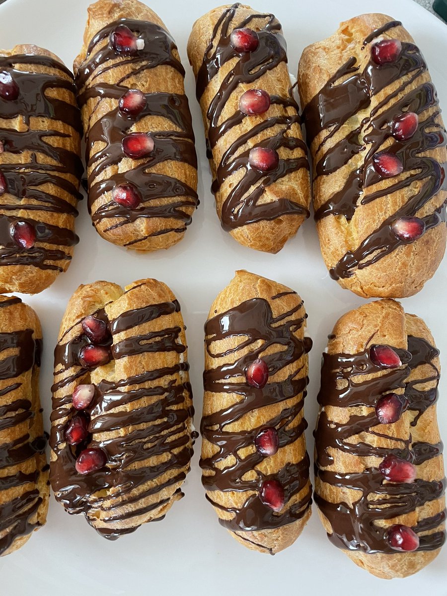 NellyDrab1's tweet photo. A busy afternoon. Eclairs with Mascarpone, lemon juice &amp; pomegranate. https://t.co/eZIELI6YCX