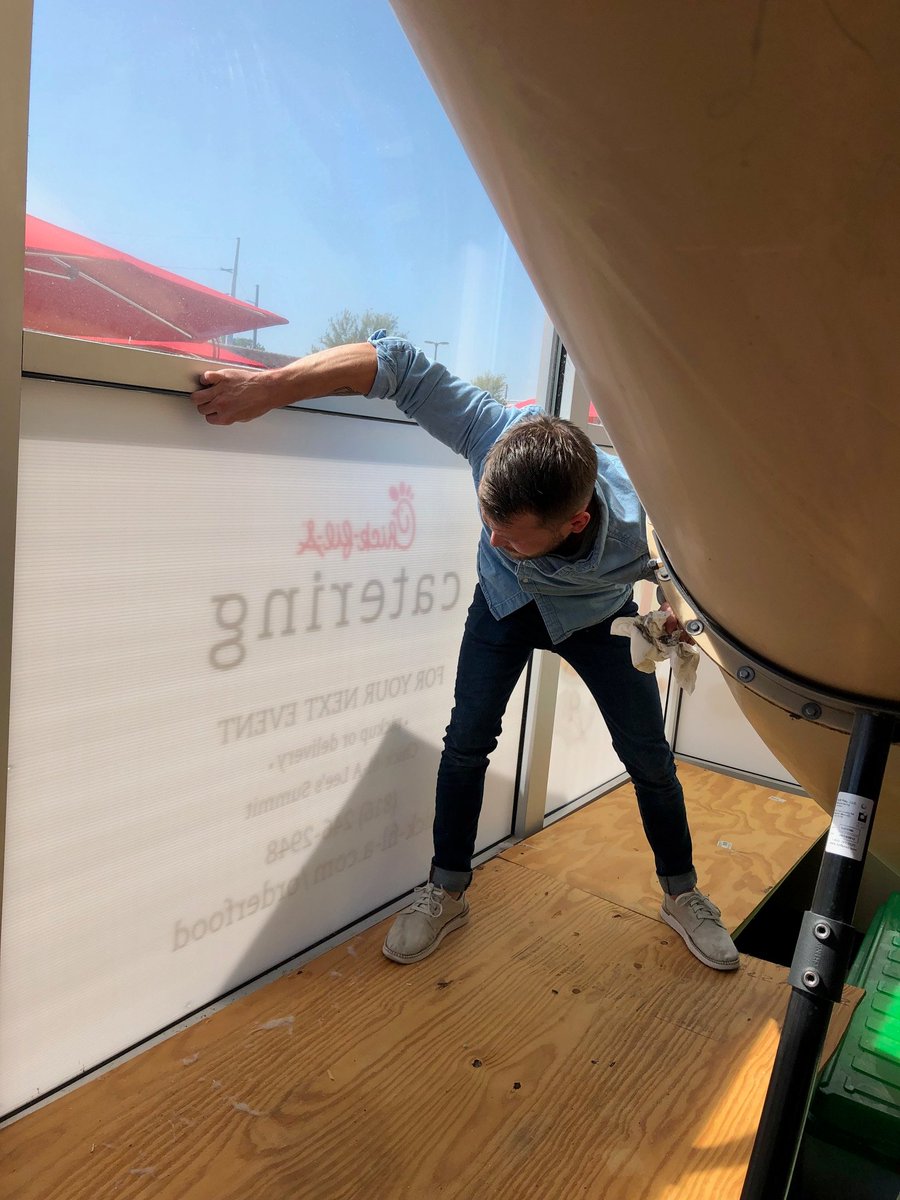 PrintGraphicsKC's tweet image. You know what looks great in all this sunshine? Beautifully designed and skillfully printed window signage! We created this solution so Chick-fil-a's window signage was easy to switch out while looking great on the outside.