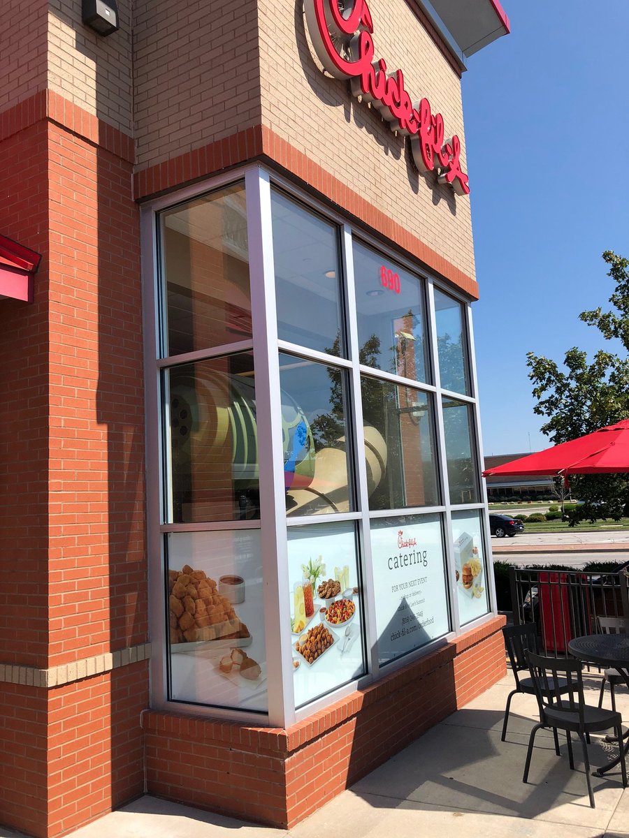 PrintGraphicsKC's tweet image. You know what looks great in all this sunshine? Beautifully designed and skillfully printed window signage! We created this solution so Chick-fil-a's window signage was easy to switch out while looking great on the outside.
