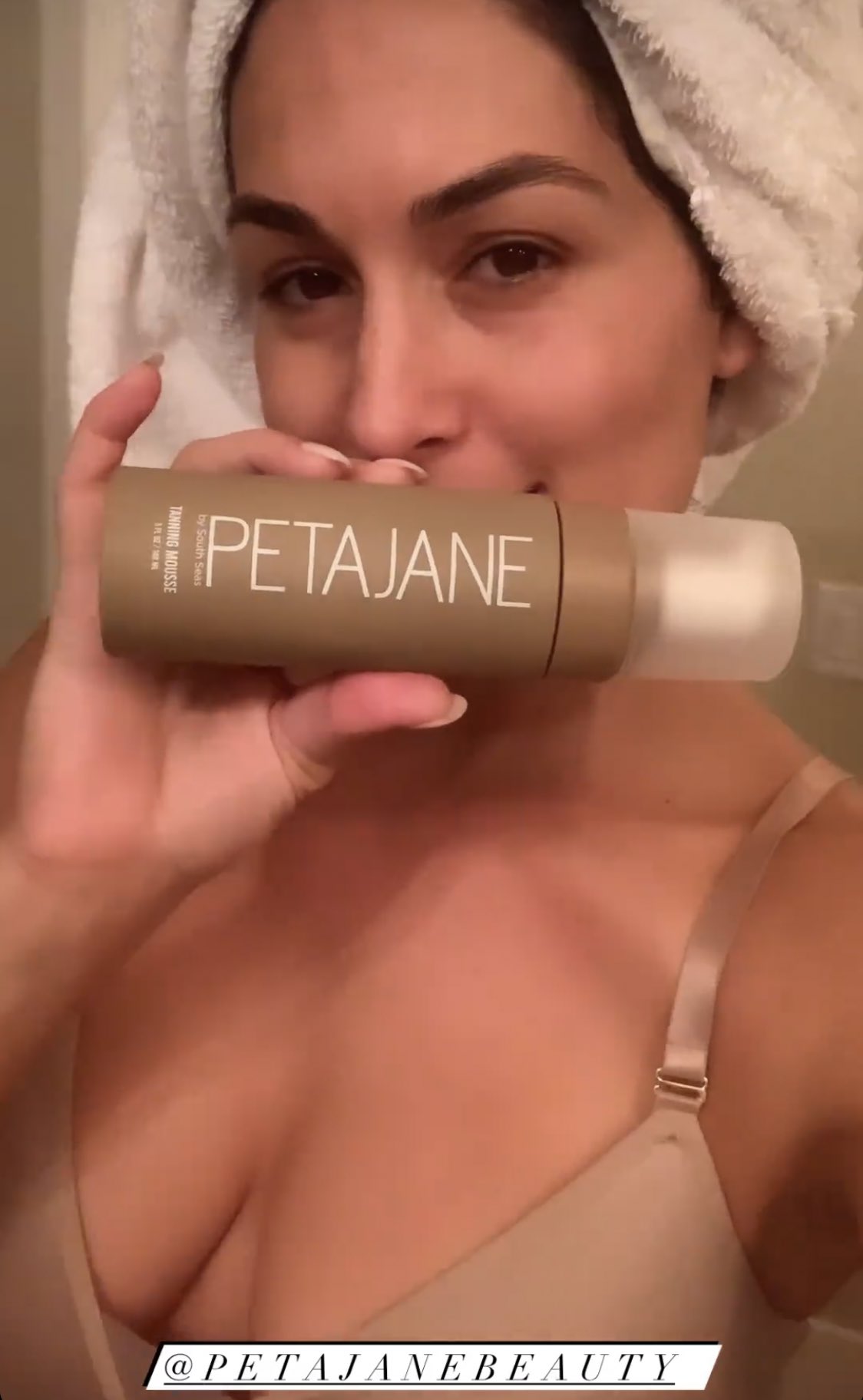 WWE Star Nikki Bella Shows Off Cleavage While Promoting Bodycare Product 6