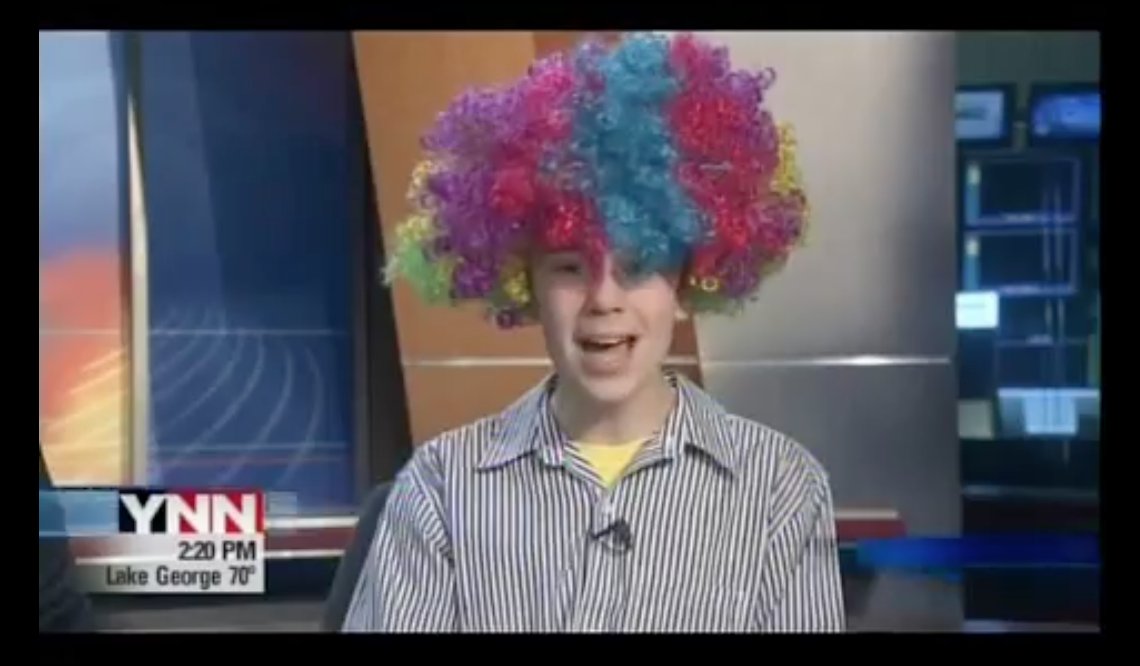 LCJReviews's tweet photo. #Madagascar3 opened nine years ago today. The next day for my on-air review, I wore Marty the Zebra's own colorful #AfroCircus wig he (and @dreamworks) sent me. https://t.co/Vd9Ll1mie2