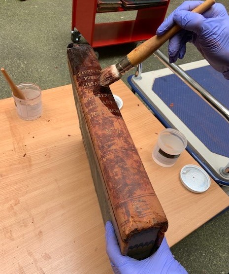BarnsArchives's tweet photo. As part of cataloguing our @BarnsleyCivic Free Public Library records, we've conserved a number of volumes to stop leather rot. Once it dries the treatment will be invisible, but will help these important documents survive another 100+ years #ArchivesInAction #Barnsley @EldonHaz https://t.co/H1M6Qs2U5I