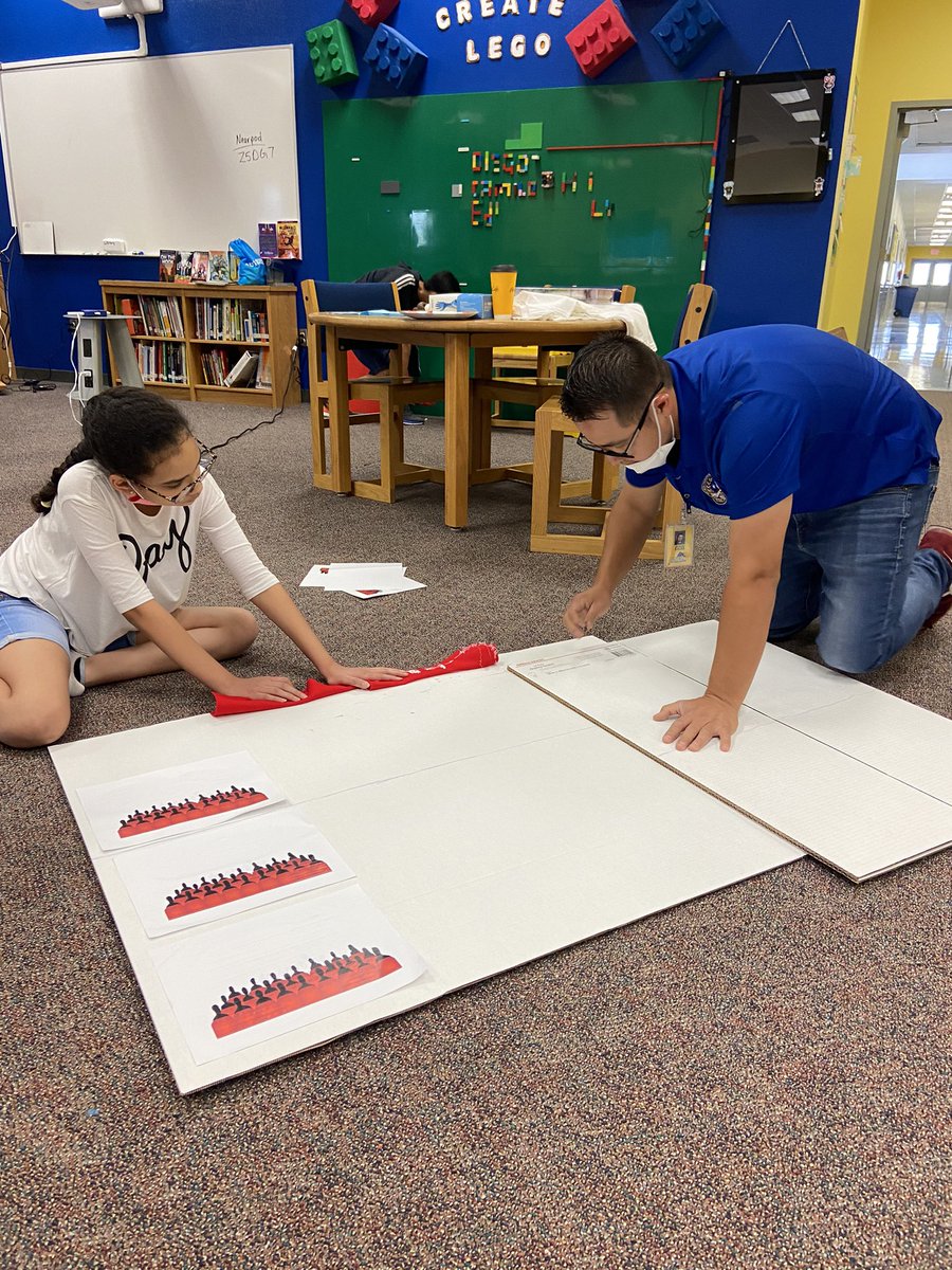 eromero915's tweet photo. In our learning community everyone gets involved. Head custodian and security officer interact with our gifted learners as they work on their projects. Summer time fun! @aduran_DWS @DW_K8S #ColtNation 💙💛🦄 #TeamSISD https://t.co/JkSKRLPaEn