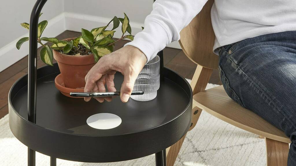 Humanscale NeatCharge 10 W wireless charger subtly attaches to the bottom of a desk thegadgetflow.com/portfolio/huma… #christmasgifthour