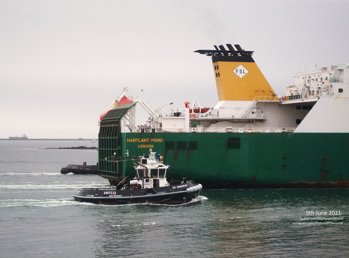 PlymouthDevon1's tweet photo. Hartland Point (Ro-Ro Cargo Ship) sailing past Drake's Island & on to Devonport Plymouth lunchtime today, guided by tugs SD Faithful, SD Deborah, +1. #Plymouth #AWShips #AWCrewing #HartlandPoint #tugs #tug #shipping #ship @RachelHWing #Serco #SDFaithful #SDDeborah #SDTamarSpirit https://t.co/8uYq4bhK2C