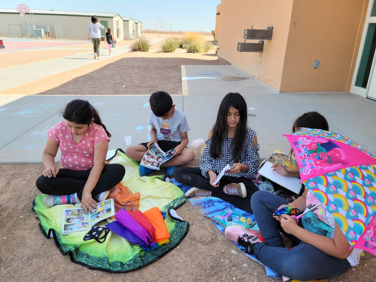 Taking a book break outside today! #LionsSpeakLife #TeamSISD