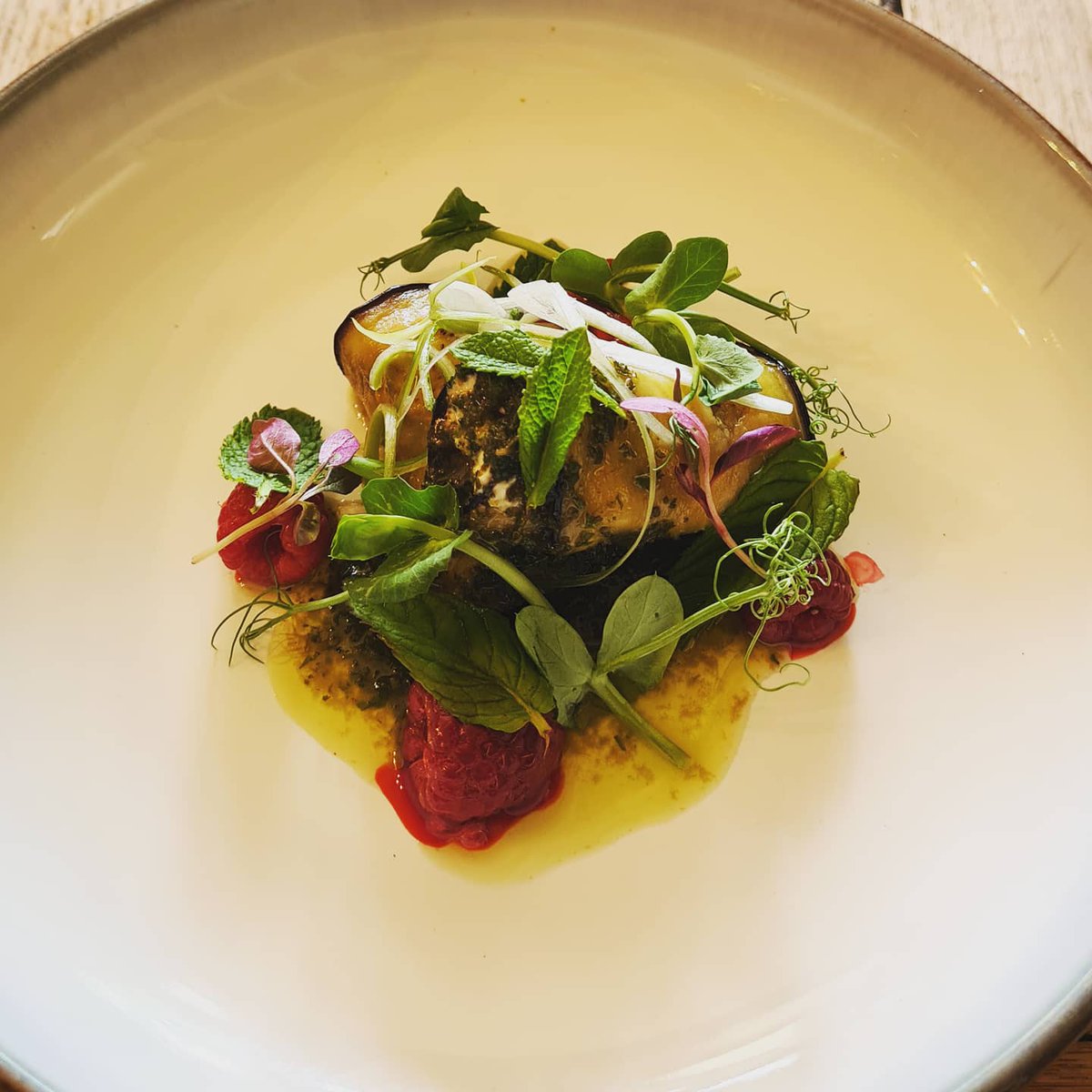 Roasted spice Aubergine stuffed with Homemade garlic and herb cheese, Finished with mint oil and raspberries. 

#hatchbeauchamp #farthingshotel #taunton #somerset #restaurant #foodie #aubergine #vegitarian #raspberries