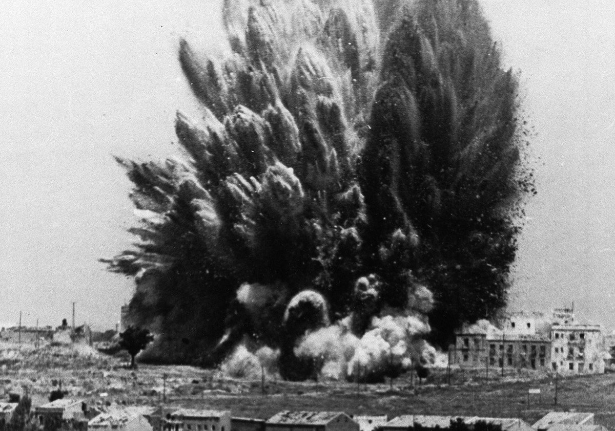 Three hundred fascists were killed in this explosion in Madrid, Spain, under the five-story Casa Blanca building, on March 19, 1938. Anti-fascist forces tunneled 600 yards over a six-month period to lay the land mines that caused the explosion.