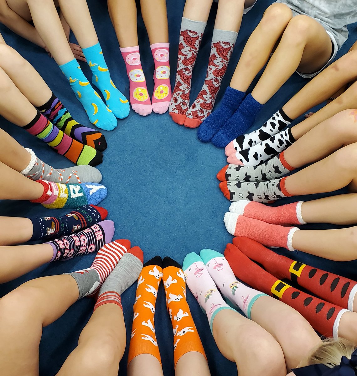 AHS_Cheer1's tweet photo. #keepitfun AHS Varsity cheerleaders wearing their crazy socks in honor of their Mascot Coach Aiden!  #ucacamp #day3 https://t.co/pdhBYK20sd