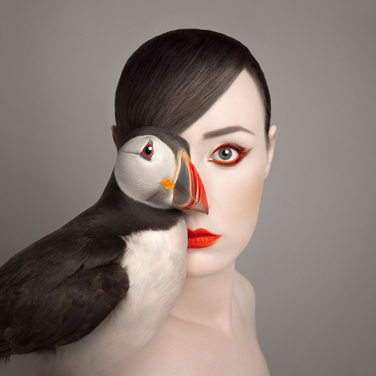 creativecloud's tweet photo. In this series of self portraits, artist @FloraBorsi uses wildlife to highlight the commonalities between humans and animals: https://t.co/zGsTpXUtUQ https://t.co/K2K0C0uhDO