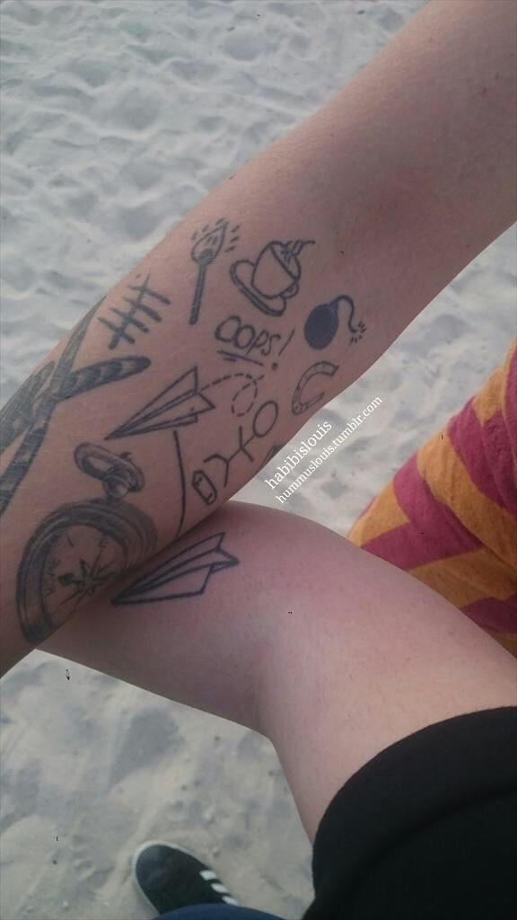 91community's tweet photo. louis and louies having matching tattoos has to be the most adorable thing ever !! 😣🤍 https://t.co/ouxlYrH232