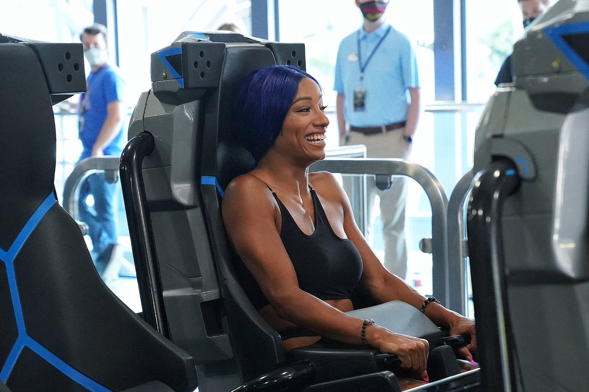 WWE's tweet photo. .@SashaBanksWWE had the chance to ride the brand new Jurassic World VelociCoaster earlier today! @UniversalORL https://t.co/tngEAM2Hnj