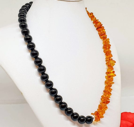 MB1961Store's tweet photo. Necklace Real Amber and Black Onyx, 925 Silver https://t.co/ISGKwO8NJT #jewelry #necklaces #beadednecklaces #925silver #chokernecklace @etsymktgtool https://t.co/29tAtdqvsD