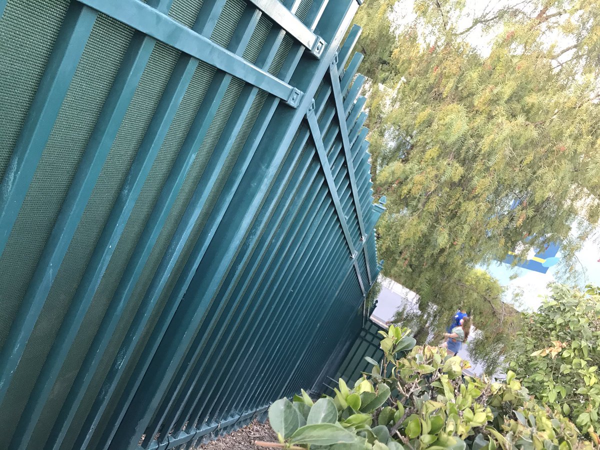 MagicAndWalnut's tweet image. A privacy screen has been installed along the green fence that runs the length of the @Disneyland tram route, further insulating guests from the “outside world” (of Disneyland Drive) as they traverse the half-mile tram route on foot.