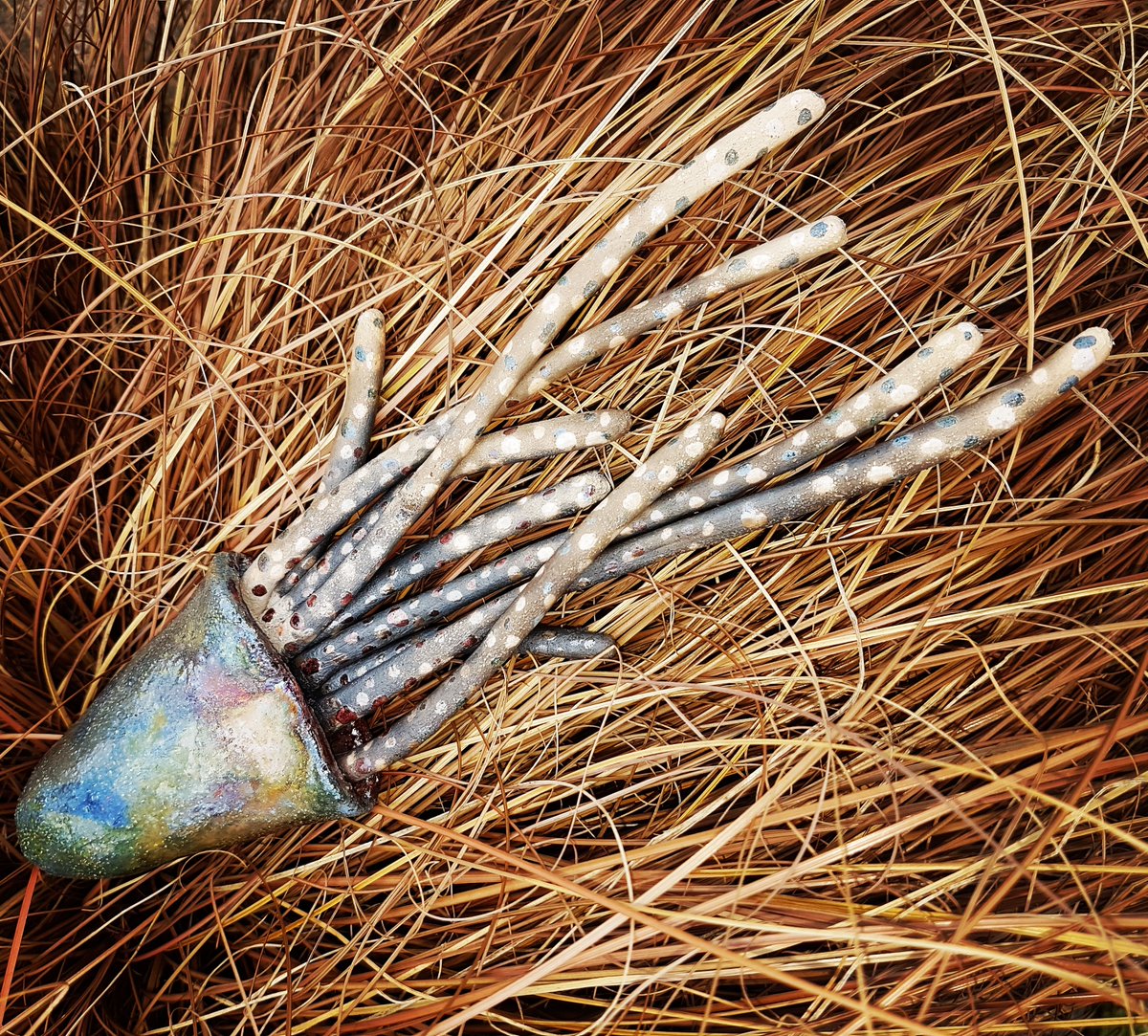 ToShowcase's tweet image. Kendra’s most recent work has been looking into whimsical decorative garden gnomes, making many different forms and designs to suit the time of year. She is also continuing to make more swimming fish and jellyfishes.