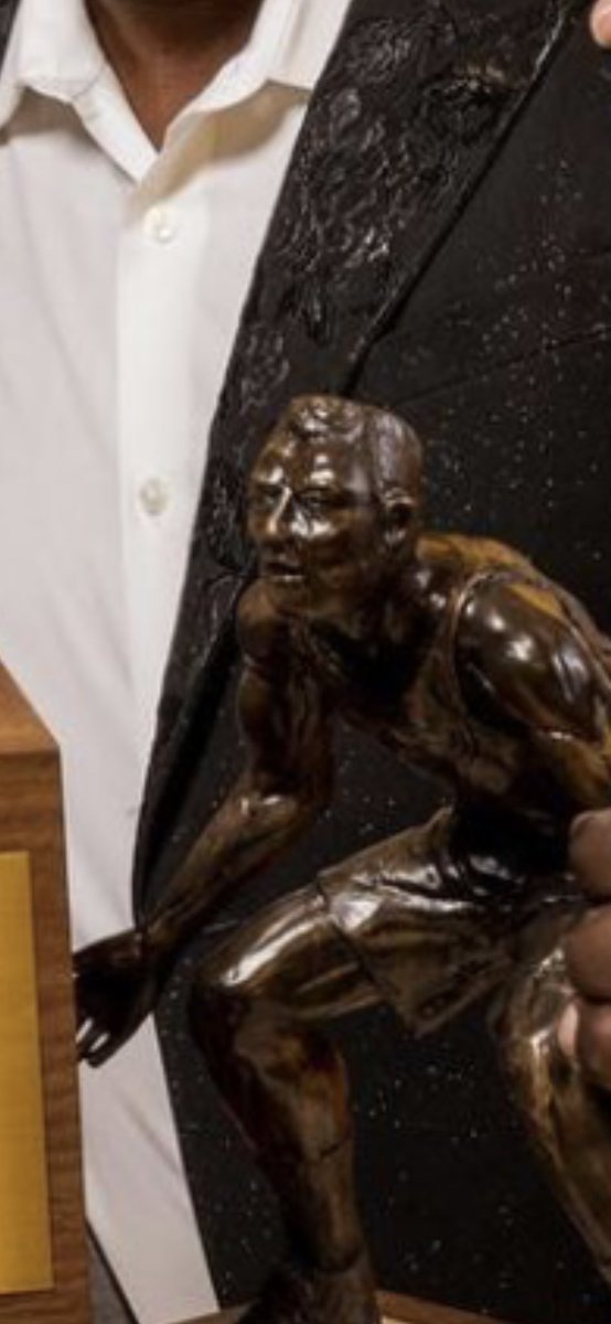 microsuede's tweet image. The NBA Defensive Player of the Year trophy appears to be modeled on late-stage Kirk Douglas.