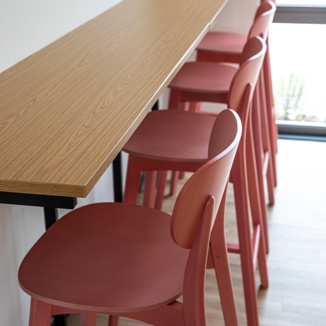 Adding strong colours is an effective way to uplift an interior. We used these red stools to create a striking contrast at the main offices of Inspired Villages.

#furniture #interiordesign #interiordesigner #chairs #furnishing #qualityfurniture