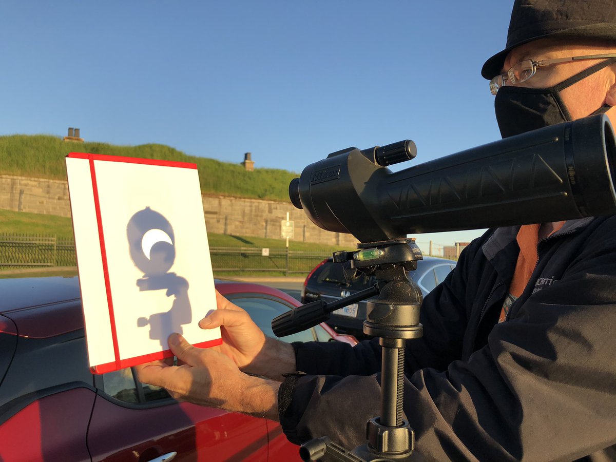 This guy is using a “bird spotter” to project the #Eclipse2021 on to paper. #halifax <a href="/csa_asc/">Canadian Space Agency</a>