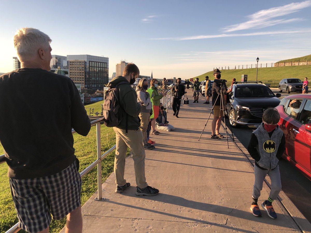 Not often you see this many people on Citadel Hill at 6:30am. #eclipse2021 #halifax. People are keeping their distance from each other.