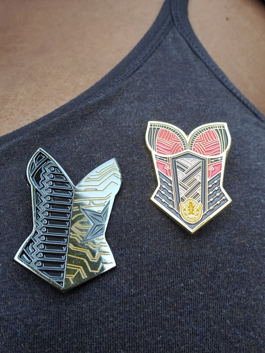 LEHLight's tweet photo. My Dora Milaje enamel pin came and a Winter Soldier/Vibranium arm pin (as a corset!!) too. Perfect pair. From Etsy store: Only Half Dead. https://t.co/axUlPWAIMN